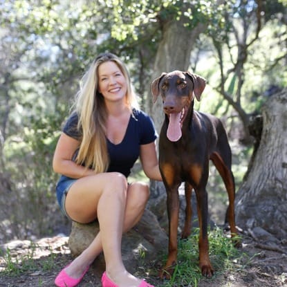 Remy the dog and his owner smiling Remy the dog and his owner smiling
